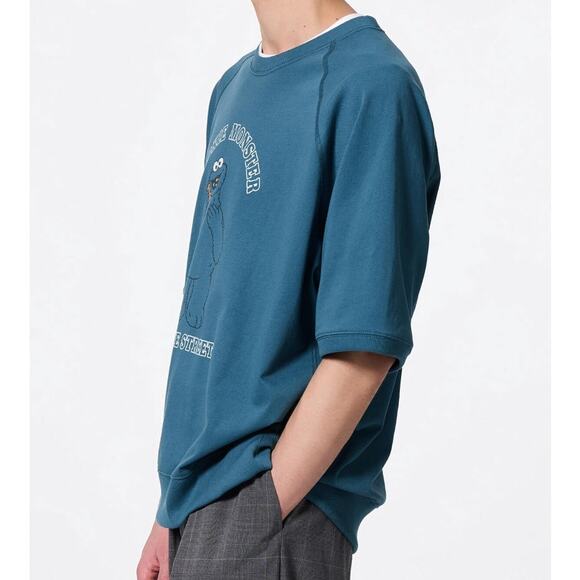 GU Uniqlo x Sesame Street Cookie Monster Half Sleeve Sweat Look T-shirt in Blue - Picture 2 of 10
